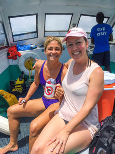 Cristina Zenato and Jill Smith shark diving